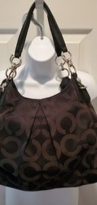 Black Coach purse with purple lining